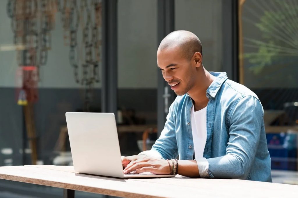 man on computer